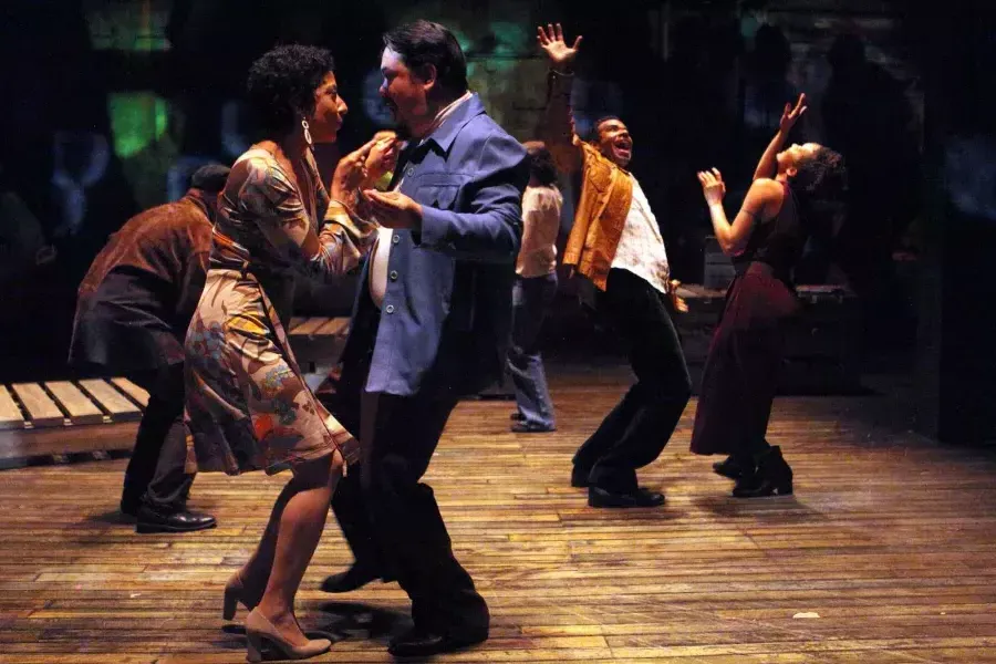 Performers in mid 20世纪costume dance on stage at the Magic Theatre during a performance of "Gangster of Love."